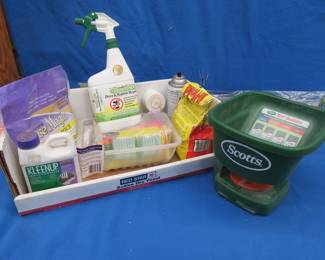 Lot 104. Three NIP door bottom sealers, lawn seeder, and garden products