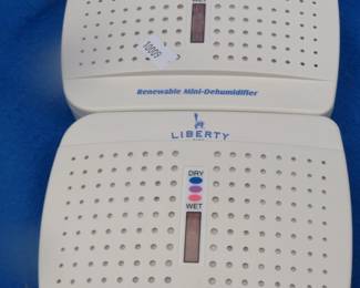 Lot 446. Two like-new Liberty Mini-dehumidifier Model 365