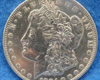 Lot 424. 1884 O Morgan Silver Dollar
