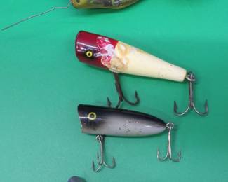 Lot 380. Vintage Heddon Weedless Widow, Jr. Popper with tack eyes, CCBC Plunker, Heddon Chugger, Jr, a Heddon Tiny Chugger, and a jointed Jitterbug