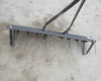 Lot 199. Pull-behind dethatcher. Matching aerator is in Lot {#}152.