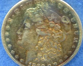 Lot 428. 1880 O toned Morgan Silver Dollar