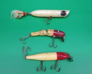 Lot 286. Vintage wooden CCBC Pikie Minnow with glass eyes, a CCBC Striper Striker, and a Paw Paw jointed baby Pike regular