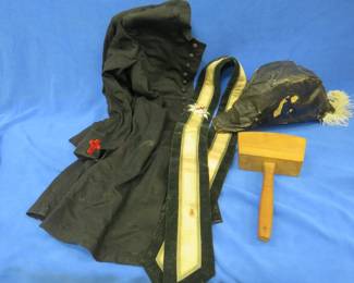 Lot 368. Vintage Masonic Knights Templar frock coat, hat, sash with a medallion, and a gavel. Coat and hat are in fair condition.