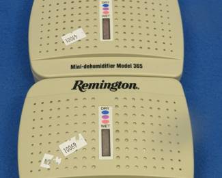 Lot 445. Two like-new Remington Mini-dehumidifier Model 365.