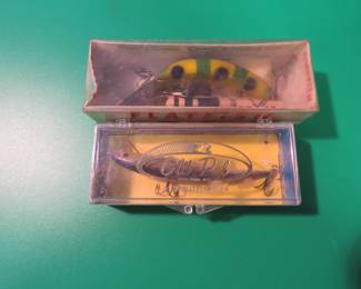 Lot 35. Vintage Woodstream jointed Old Pal in the box and a Helin 4" frog spot Flatfish in a box with papers marked L9