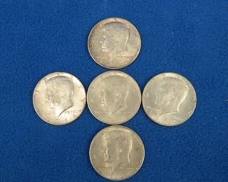 Lot 462. Five 1964 silver Kennedy half dollars
