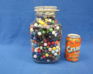 Lot 40. 2-quart locking-lid glass jar with marbles. Total weight (jar and marbles) is just over 12 lbs.