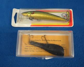 Lot 285. Old Settler 3" surface bait in a box with papers, NIP 4 1/2" Luhr Jensen Minnow
