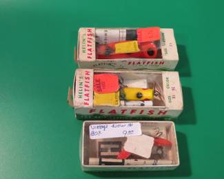 Lot 66. Three vintage Helin Flatfish in boxes with papers