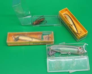 Lot 330. Two South Bend Finn-Orenos in boxes, an unidentified see-through bait and more