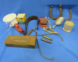 Lot 276. Collectibles including a razor strop, cigarette rolling machine, ice tongs, and more