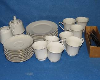Lot 237. White dish set with tableware. These were NIB prior to photos.