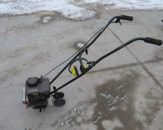 Lot 154. Craftsman 10" mini-tiller. Has compression.