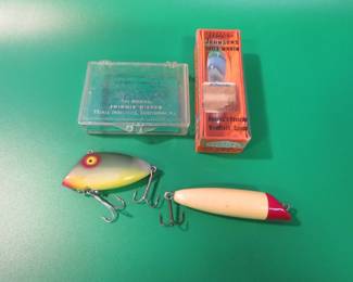Lot 37. Johnson's Silver minnow in a box marked No. 1210, 2 1/2" Tackle Industries Swimmin Minnow in a box, and an unidentified 3" chugger-style bait