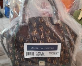 Dooney and Bourke Collection
To see the entire authenticated collection,
Call Michelle