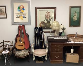 ACOUSTIC GUITAR, TRUMPET, KEYBOARD, WORK DESK, ARTWORK, ACCENT ARM CHAIR, ROULETTE WHEEL