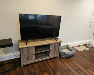 entertainment cabinet and television