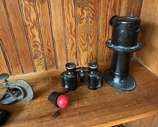 From Left to Right
Vintage Tire puncture tool
*Push button switch
*Vintage binoculars 
* A vintage "Ah-Oogah" horn, likely a Sparton Model A Ford horn from the late 1920s or early 1930s.