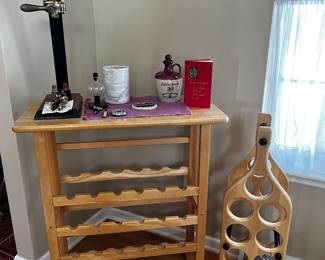 Nice Wine Cabinet, holds 24 bottles.  Another wine bottle holder, shaped like a wine bottle, which holds 11 bottles