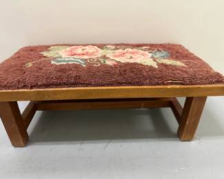 Latch-Hook Footstool | Wooden foot stool with floral fabric design, appears to be latch-hook. - h. 7.5 x w. 22 x d. 11.5 in
