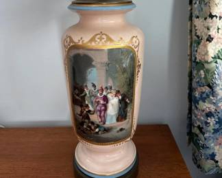Pair Hand-Painted Scenic Lamps | A pair of antique porcelain table lamps each with a finely painted scene within gilt cartouche, with white linen shades.