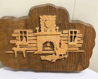 Artwork - Winter Cabin | Vintage carved scroll mounted on wood of man and dog in a winter cabin scene. -  h. 9.5 x w. 14.5 in
