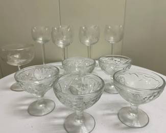 Misc. Glass Stemware | Miscellaneous stemware including: 6 etched (floral) wine glasses. 5 pressed glass sorbet glasses. Champagne flute

