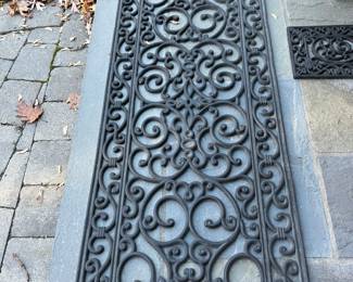 Outdoor Runner Rugs | Narrow outdoor rubber runner rug and a second, slightly wider rug.