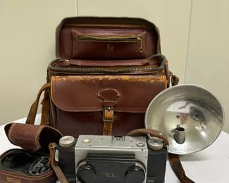 Reelist Camera & Case | Antique "Reelist" camera with leather carrying case.