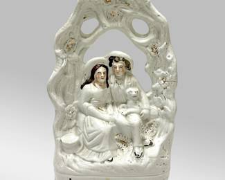 Staffordshire Wedding Figurine | 
Antique Staffordshire wedding figurine. - h. 14.5 x w. 9.5 x d. 3 in
