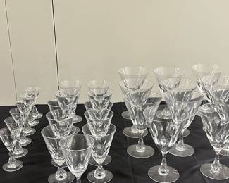(30pc) Misc. Cut Crystal Wine Glasses | 11 Water glasses: h. 6.5 in. 13 Wine glasses: h. 5 in. 6 Apertif glasses: h. 4 in.
