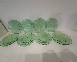 (8pc) Green Glass Plates | Vintage green glass plates with central swirl pattern. -  dia. 8 in
