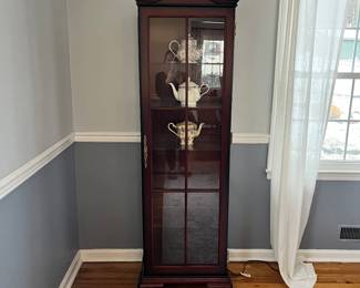 Lovely cherry wood with glass shelves and interior light