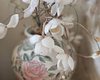 Vase with flower arrangement