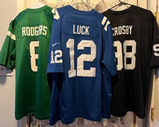 Aaron Rodger’s Jets jersey; Andrew Luck Colts jersey (stitched); Max Crosby Raiders jersey