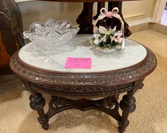 Small antique oval carved table