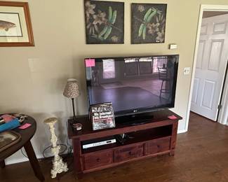 Smart TV with Roku, Ent cabinet, wall art