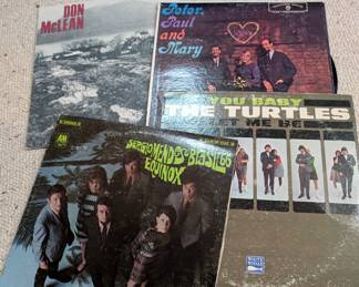 100's, maybe 1000's of record albums