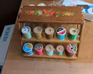 Cute thread holder. Folds up to be flat.