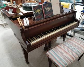 Baby Grand Piano!!!  Wurlitzer.   I have marked this very low.  You will have to have someone move it for you.   We cannot help.