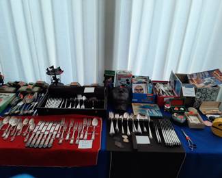 Many sets of silver plate