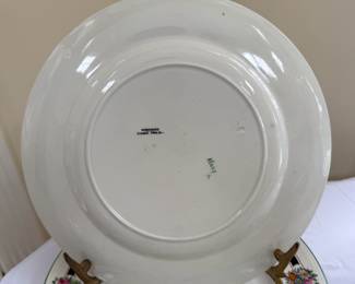 Base of set of Wedgwood Etruria plates, made in England, floral ring pattern