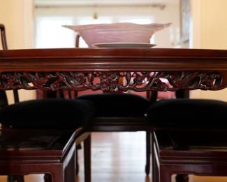 Carved detail on the apron of the Chinese style dining table