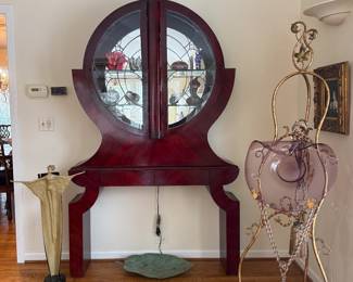 Spectacular c. 1930's English Art Deco display cabinet with art glass, large art glass blow, and a wrought iron easel