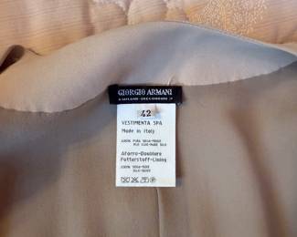 Closeup of Giorgio Armani single button 100% silk wrap top, made in Italy, size 42