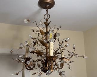 Another view of the bronze three-light chandelier, leafy branches and crystal blossoms