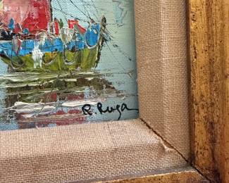 Closeup of signed small oil painting of boats near a shore with houses at water's edge, carved wooden frame