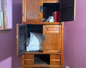 Another view of Chinese 19th Century kitchen cabinet with bamboo doors on two top storage compartments and sliding panels at the base