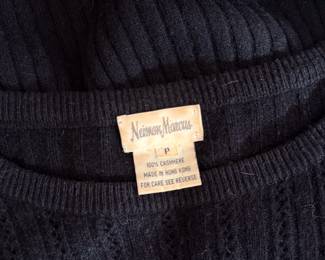 Closeup of Neiman Marcus 100% cashmere black long sleeve pullover sweater, size P